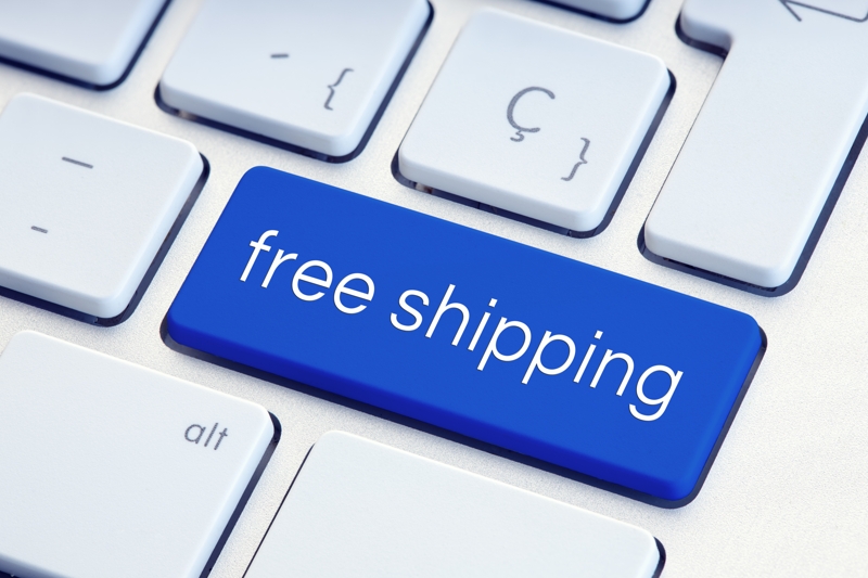 Free shipping phrase on blue computer keyboard key