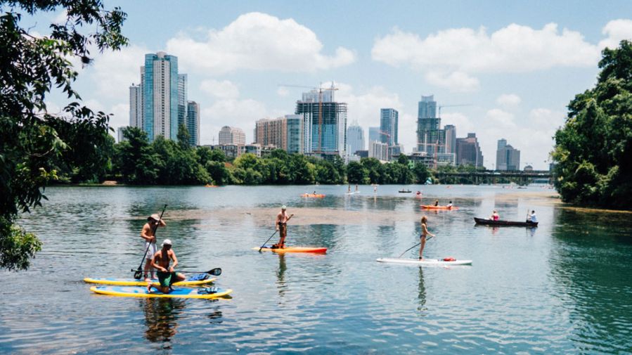 Image of people on paddle boards in the river and lake near Austin Texas